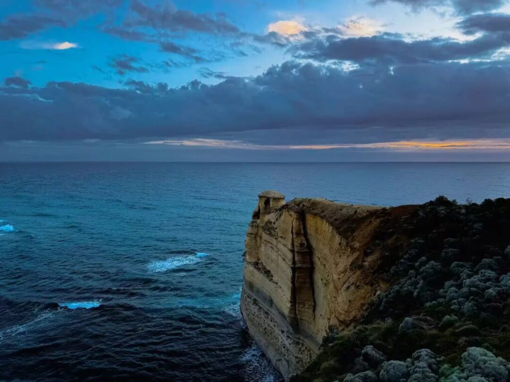Razorback cliff overlooking Southern Ocean at sunset on Great Ocean Road Shipwreck Coast