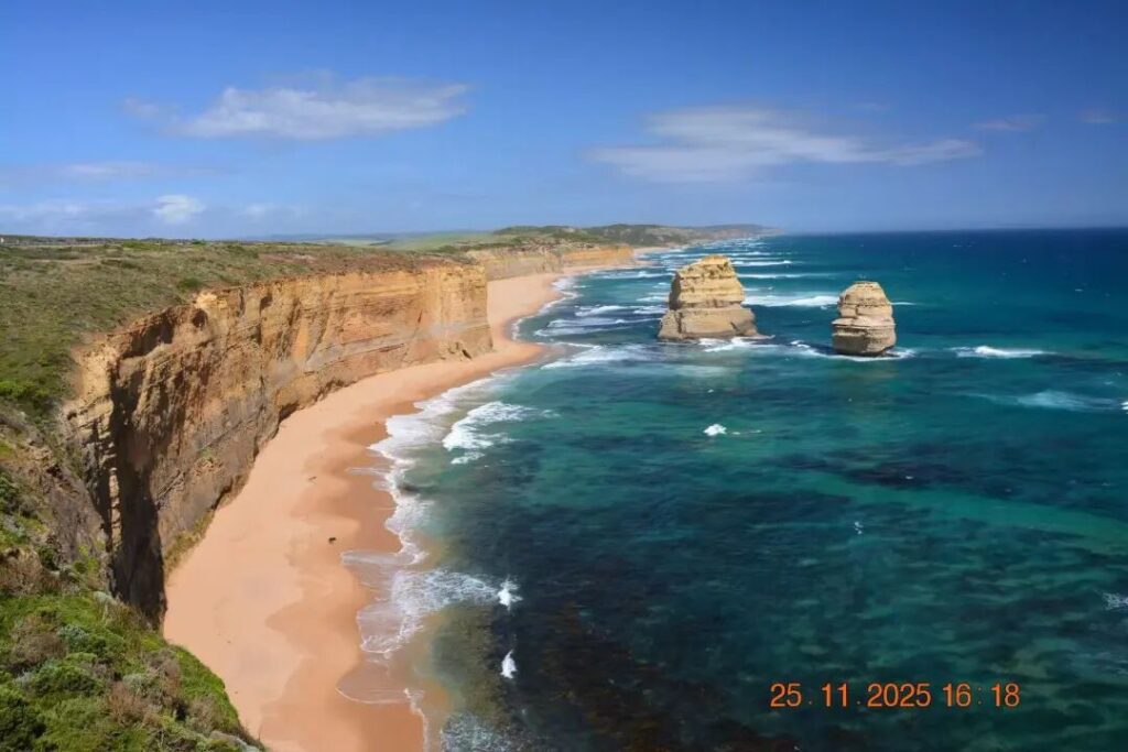 Twelve Apostles limestone coastline with golden beach on Great Ocean Road Victoria