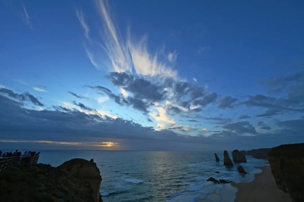 Evening sunset with dramatic clouds over Twelve Apostles on Great Ocean Road Victoria