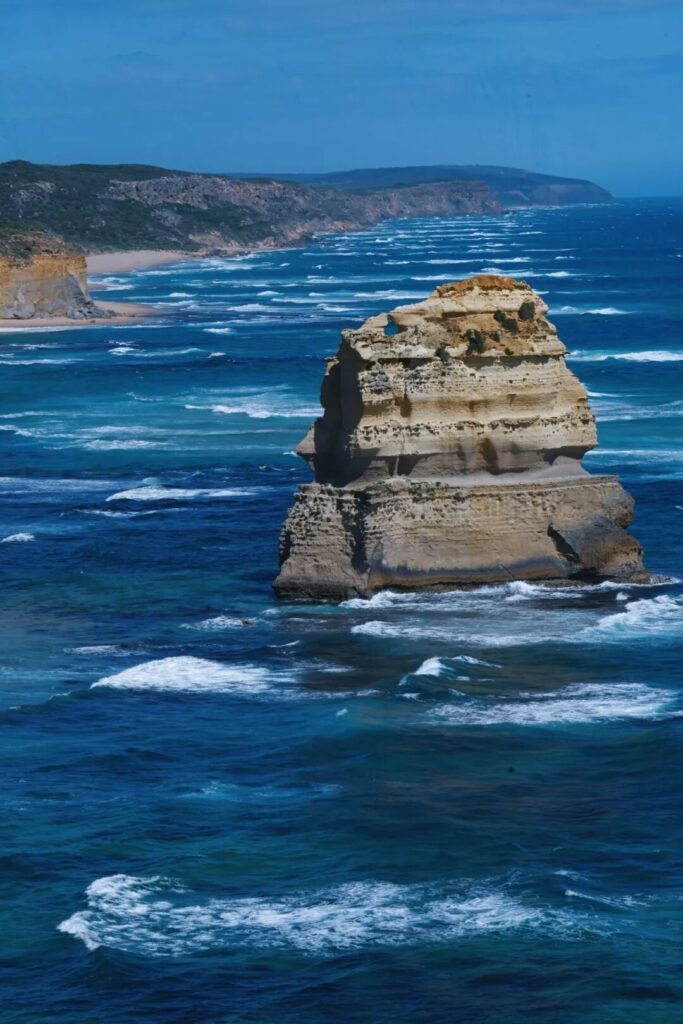 Close-up of Twelve Apostles sea stack with crashing waves on Great Ocean Road